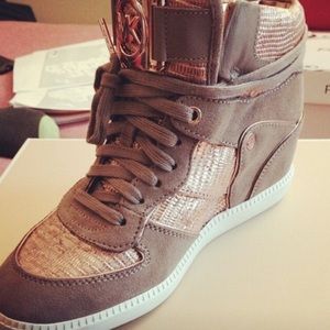 Michael kors heeled sneakers.